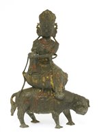 Lot 194 - A Chinese bronze Guanyin