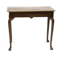 Lot 663 - A George III country made oak side table