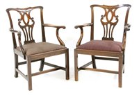 Lot 814 - A pair of mahogany Chippendale style elbow chairs