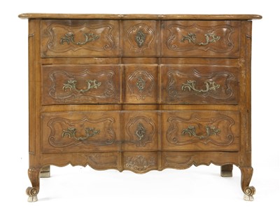 Lot 762 - A French walnut serpentine front commode
