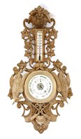 Lot 629 - A late 19th century Blackforest style wall barometer