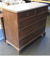 Lot 538 - A George III oak chest of drawers, the moulded rectangular top