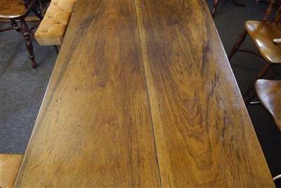 Lot 570 - A French walnut farmhouse table