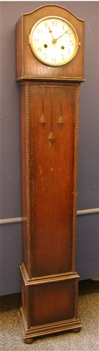 Lot 364 - A 1920s oak cased grandmother clock, with...