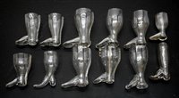 Lot 263 - A collection of twelve glass boot form stirrup cups