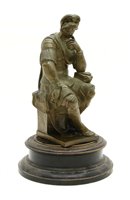 Lot 248 - A bronze figure of a seated centurion deep in...