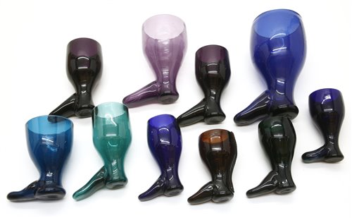 Lot 420 - A collection of coloured glass boot form stirrup cups
