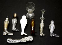 Lot 133 - A collection of glass boot form scent bottles