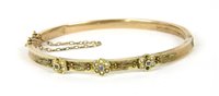 Lot 47 - A Victorian hollow shallow court hinge bangle,...