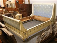 Lot 556 - A French painted bed, with printed fabric head...