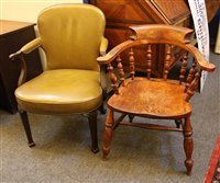 Lot 680 - An ash and elm smoker's bow elbow chair