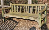 Lot 1102 - Two teak slatted garden benches