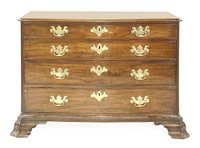 Lot 797 - A serpentine mahogany commode chest