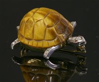 Lot 226 - A gold and silver tiger's eye, diamond and ruby tortoise brooch