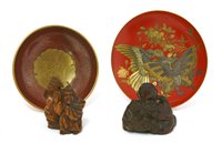 Lot 499 - Two Japanese wood netsuke and two lacquered dishes