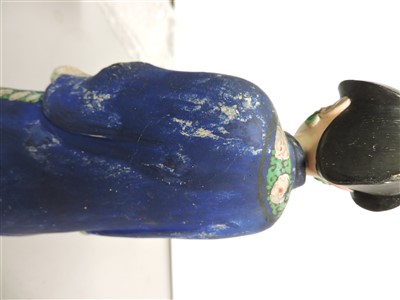 Lot 90 - A Chinese painted clay nodding-head figure