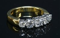 Lot 361 - An 18ct gold graduated five stone diamond ring