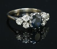 Lot 507 - A white gold sapphire and diamond ring