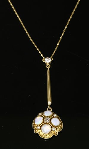 Lot 111 - A late Victorian gold, diamond and opal Etruscan revival Edna May pendant