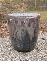 Lot 1050 - A glazed crucible planter, 54 cm diameter, 60 cm high