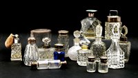 Lot 218 - Sixteen various cut glass scent bottles and...