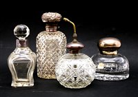Lot 333 - Five silver mounted cut glass scent bottles,...