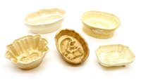 Lot 492 - Thirty pottery jelly moulds