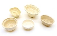 Lot 300 - Pottery jelly moulds, comprising 32 smaller, 3...