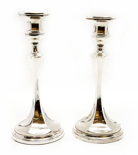 Lot 170 - A pair of silver candlesticks, by Wilmott Manufacturing Company, Birmingham, 1927, 26.5cm high