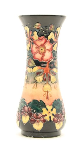 Lot 257 - A modern Moorcroft vase decorated in the Oberon Honeysuckle pattern, 20.5cm high
