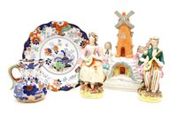 Lot 332 - Five various Staffordshire figures, two ironstone jugs and nine ironstone plates and a dog