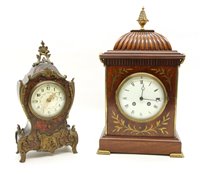 Lot 321 - An Edwardian brass inlaid mahogany mantel clock