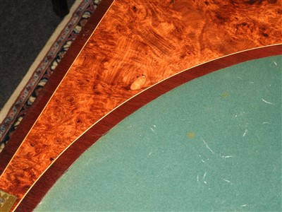 Lot 814 - An amboyna inlaid card table