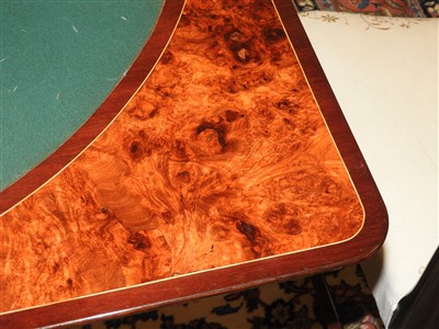 Lot 814 - An amboyna inlaid card table