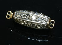 Lot 659 - A Victorian two row diamond set hexagonal form barrel clasp