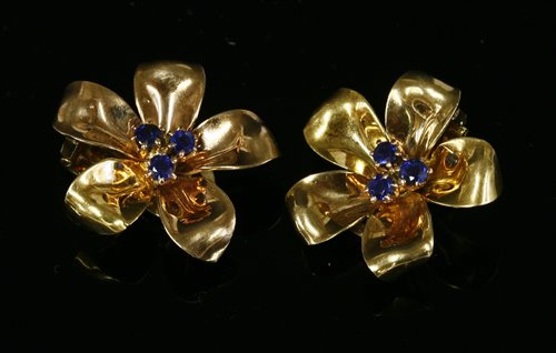 Lot 216 - A pair of gold, sapphire flower head earrings, c.1950