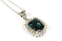 Lot 56 - An 18ct white gold tourmaline and diamond cluster pendant