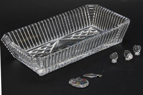Lot 128 - A collection of Swarovski crystal items, to include a model of a fish, a butterfly, a shell, a quantity of `Crystal Memories' items and a Waterford Crystal tray