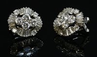 Lot 302 - A pair of white gold diamond set ballerina oval cluster earrings