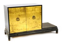 Lot 667 - A modern Chinese style lacquered cabinet