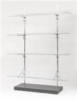 Lot 423 - A pair of chrome and glass shelves
