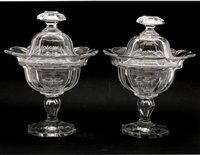 Lot 440 - A pair of Victorian confiture jars and covers, 25.5 cm high (chips)