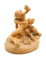 Lot 570 - A 19th century terracotta figure group of a young satyr