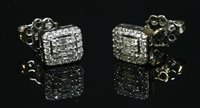 Lot 473 - A pair of white gold diamond set rectangular halo cluster earrings