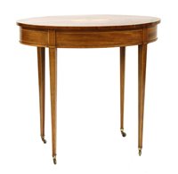 Lot 818 - An Edwardian mahogany and yew wood oval side table