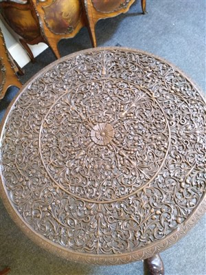 Lot 793 - An Indian hardwood centre table