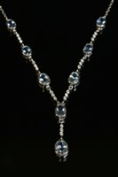 Lot 203 - A white gold aquamarine and diamond necklace