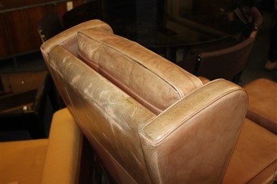 Lot 394 - A pair of leather armchairs