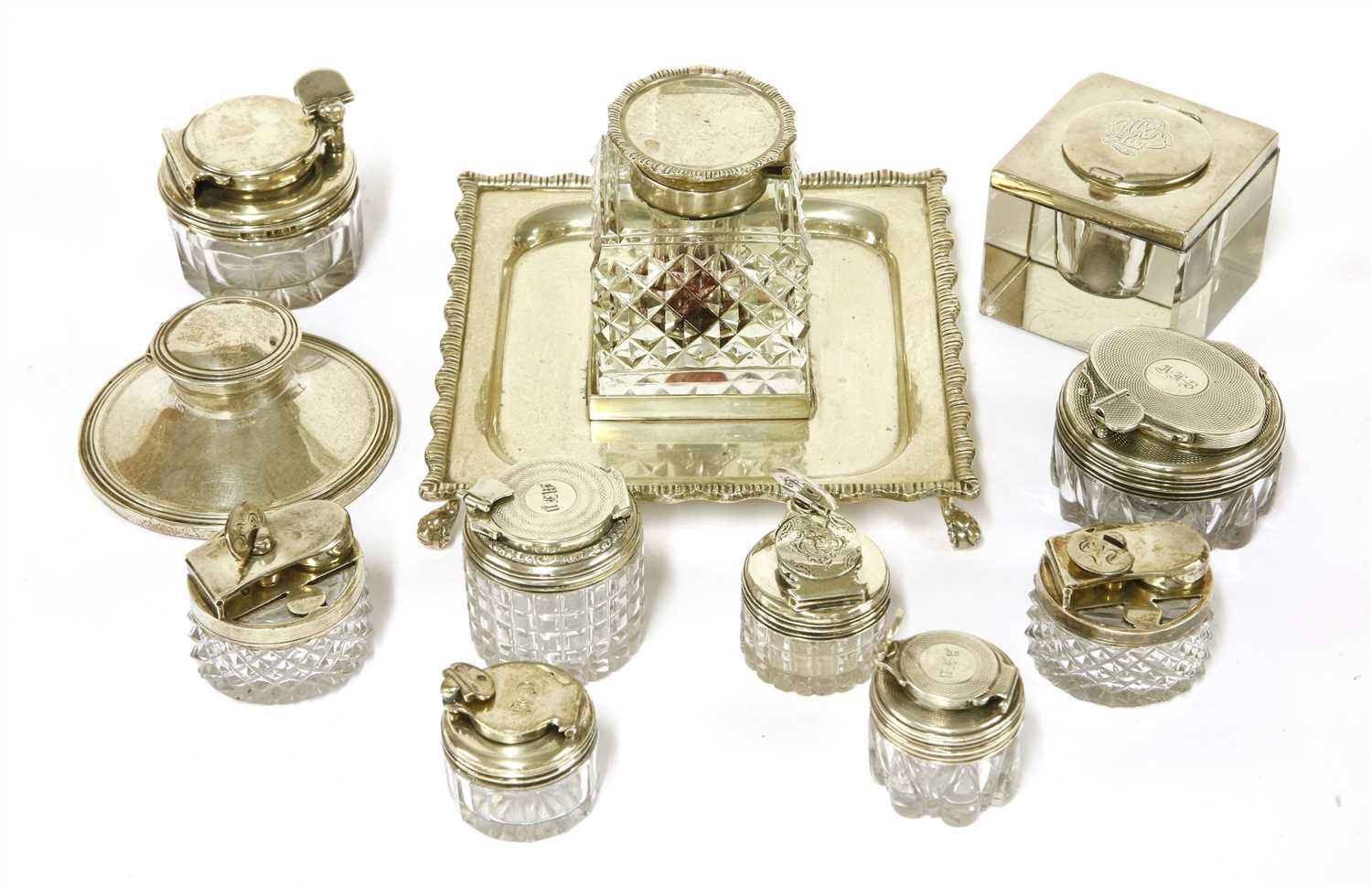 Lot 49 - Eleven silver-mounted glass inkwells