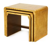 Lot 203 - An Art Deco maple nest of tables